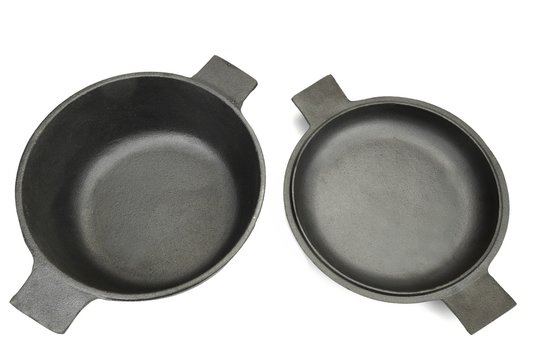 High Angle View On The Opened Cast Iron Pan Isolated