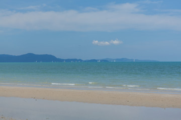 Sailboats on the horizon