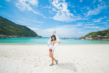 Woman happy when her travel to Racha Island, Phuket Thailand