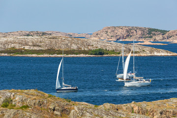 Sailboats in the rocky archipelago in the Swedish coast