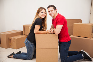Hispanic couple moving in