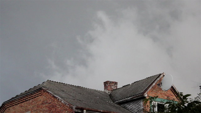 black storm clouds over the house