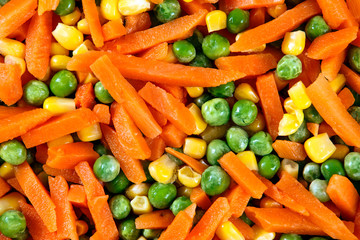 Fresh and Tasty Mix of chopped vegetables close-up as background