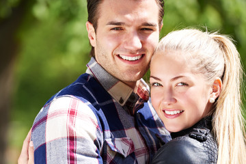 Fototapeta premium Romantic happy couple with lovely smiles