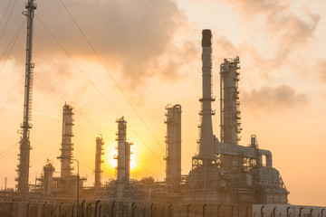 Fototapeta na wymiar Oil refinery power station at sunshine
