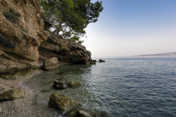 Fototapeta na wymiar Small stone island in Brela, Croatia.