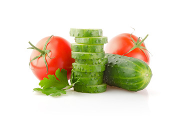Fresh Tomatoes, Cucumbers and Parsley isolated on white