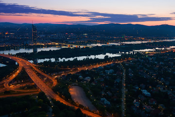 Vienna at night with Danube River & Island (Donauinsel).