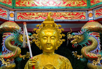 colorful chinese dragon at the wall of temple, Thailand