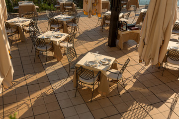 Terrace restaurant on sunset light ready for dinner