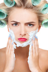 Cheerful young woman wants to shave her beard