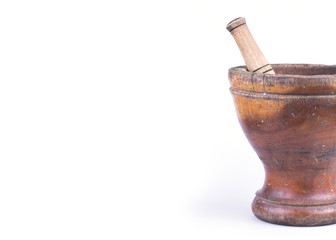 wooden mortar and pestle isolated on white background