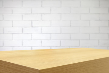 Empty table and white brick wall background