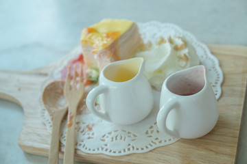 Rainbow Crepe Cake on the marble table 