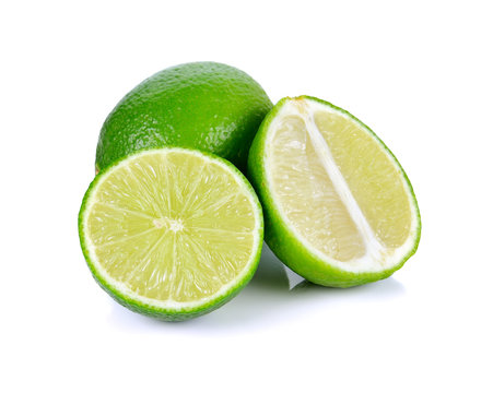 Limes with half isolated on white background