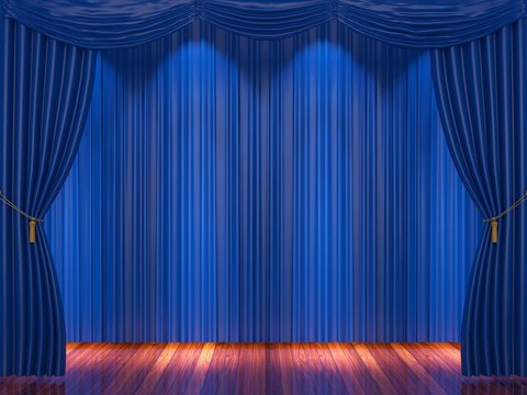 Stage with  blue curtains and spotlight.