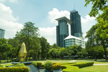 City park under blue sky with in the Background