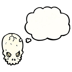 cartoon spooky skull with thought bubble