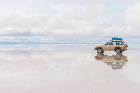 Car on the Uyuni Salar in Bolivia