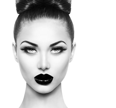 High fashion beauty model girl with black make up and long lushes
