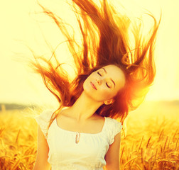 Beauty romantic girl outdoors in sun light