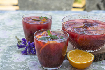 Refreshing red sangria with orange juice and fruit