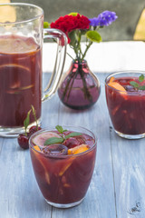 Refreshing red sangria with orange juice and fruit