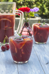 Refreshing red sangria with orange juice and fruit
