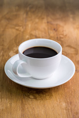 Coffee cup on a wooden table