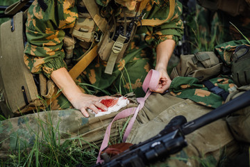 a military doctor to help the wounded soldier