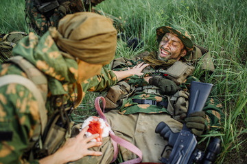 a military doctor to help the wounded soldier