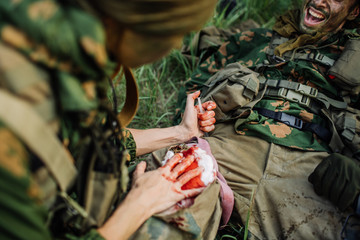 a military doctor to help the wounded soldier