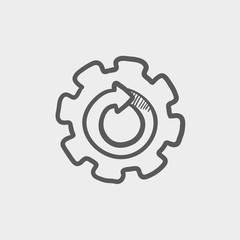 Gear wheel with arrow sketch icon