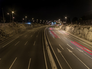 Fototapeta na wymiar Estelas de coches en autopista,Torrelodones,Madrid,España