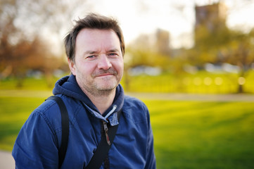 Outdoors portrait of middle age man