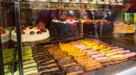 Selection of Cakes and Pastries in Bakery Window