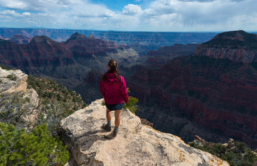 Naklejka premium Hiker Girl at Bright Angel Point Grand Canyon North Rim