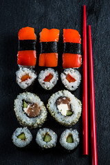 Japanese sushi with chopsticks from above