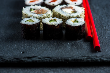 Japanese sushi with chopsticks