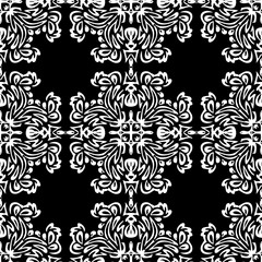 Seamless background made of exotic pattern in black and white co