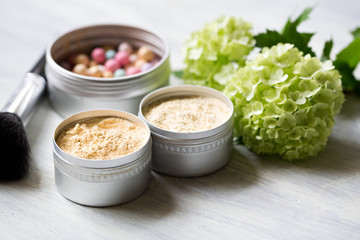 Handmade powder in metal jars 