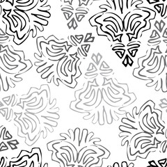 Seamless background made of exotic pattern in black and grey col