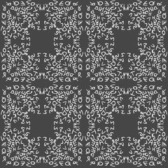 Seamless background made of letters in grey and white colors