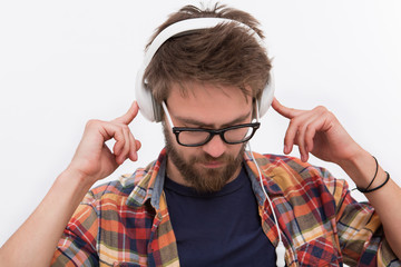 Bearded man in earphones
