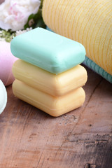 towels set, aroma therapy, soap and sea salt on wooden plate
