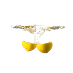Fototapeta na wymiar Lemon splash on water, isolated on white background