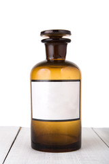 Vintage medicine bottle with blank label