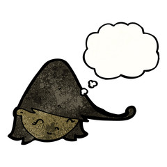 cartoon female face with thought bubble