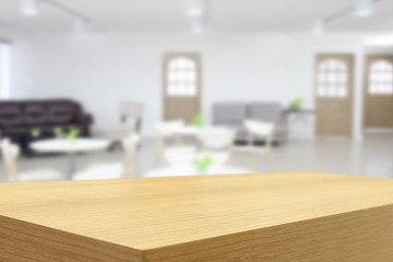 Empty wooden table and white room interior background