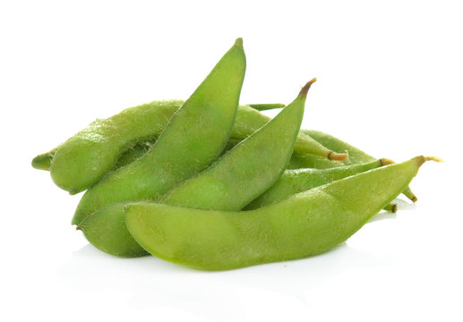green soybeans on white background